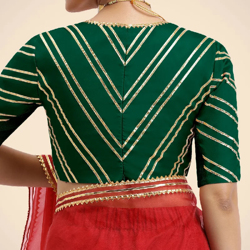 Navya x Tyohaar | Bottle Green Elbow Sleeves FlexiFit™ Saree Blouse with Plunging V Neckline with Tasteful Golden Gota Lace