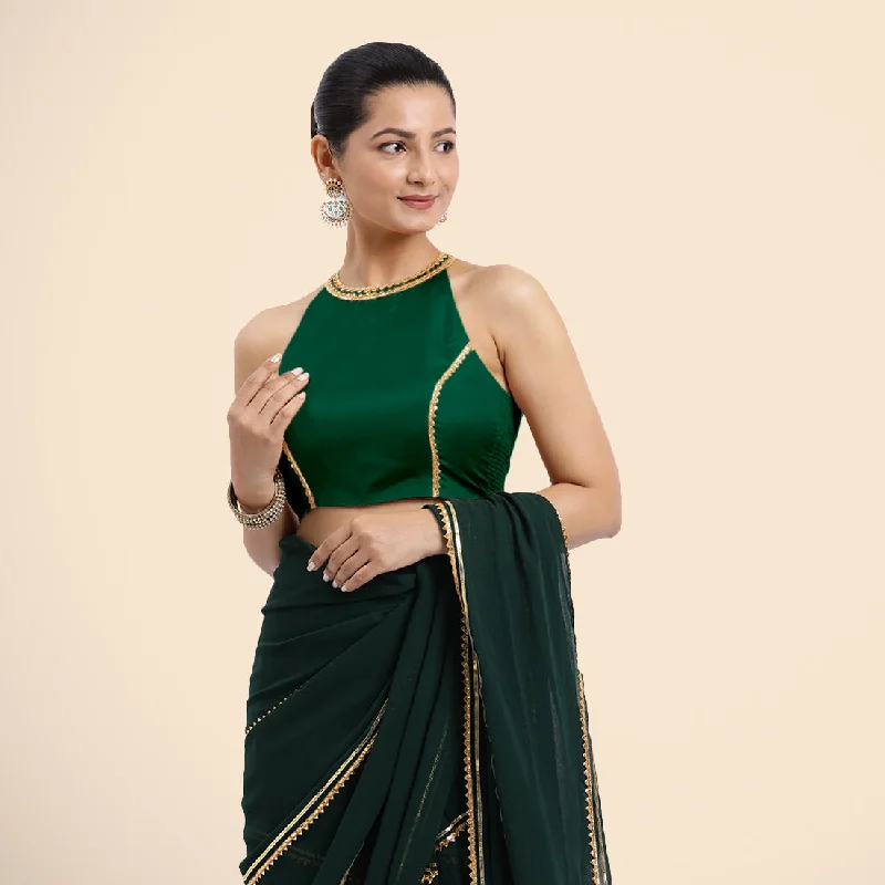 Zubeida x Tyohaar | Bottle Green Halterneck FlexiFit™ Saree Blouse with Elegant Golden Gota Embellishment on Princess Line