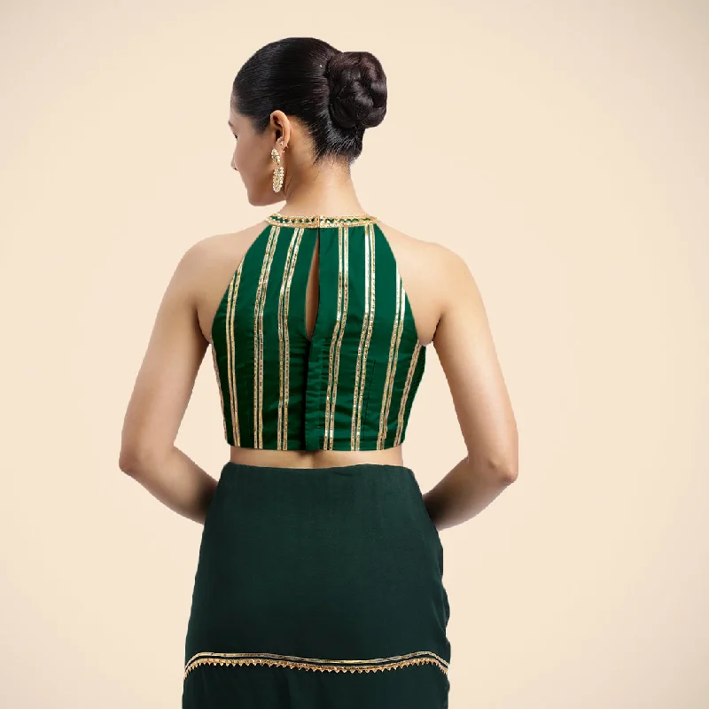 Zubeida x Tyohaar | Bottle Green Halterneck FlexiFit™ Saree Blouse with Elegant Golden Gota Embellishment on Princess Line