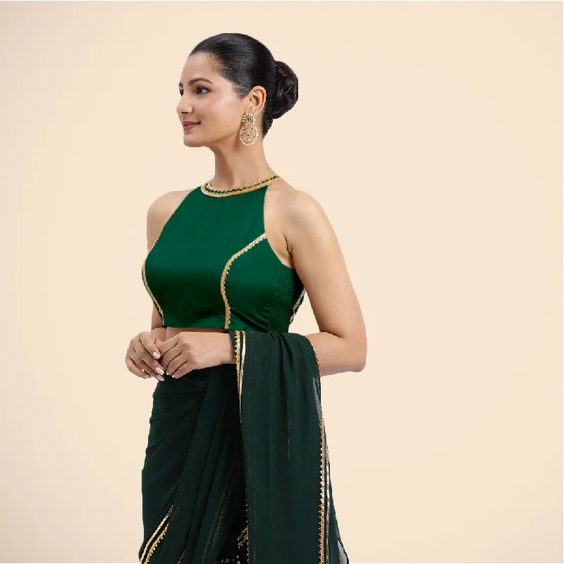 Zubeida x Tyohaar | Bottle Green Halterneck FlexiFit™ Saree Blouse with Elegant Golden Gota Embellishment on Princess Line