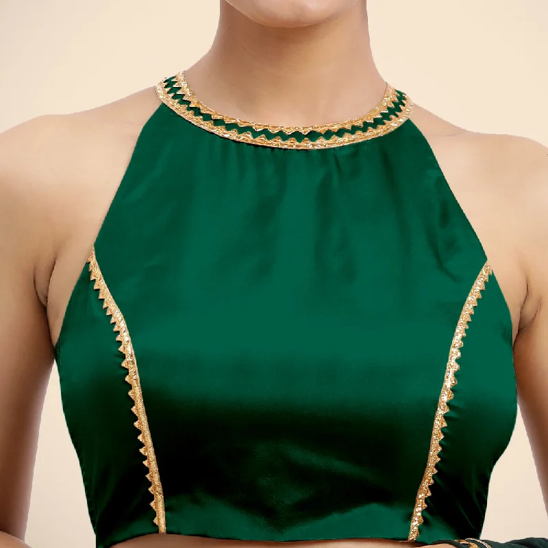 Zubeida x Tyohaar | Bottle Green Halterneck FlexiFit™ Saree Blouse with Elegant Golden Gota Embellishment on Princess Line