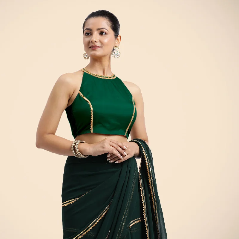 Zubeida x Tyohaar | Bottle Green Halterneck FlexiFit™ Saree Blouse with Elegant Golden Gota Embellishment on Princess Line