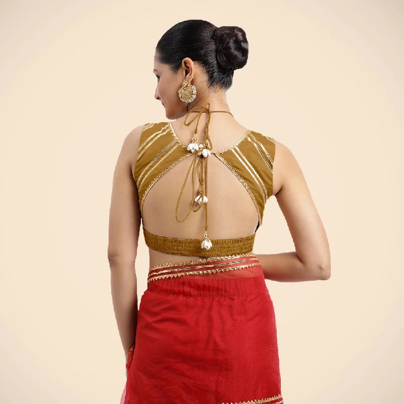 Ahana x Tyohaar | Bronze Gold Sleeveless FlexiFit™ Saree Blouse with Plunging Neckline and Back Cut Out with Tasteful Golden Gota Lace Embellishment