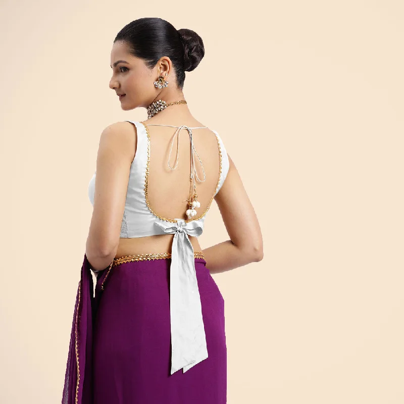 Raisa x Tyohaar | Pearl White Sleeveless FlexiFit™ Saree Blouse with V Neckline with Golden Gota Lace Embellishment and Back Cut-out with Tie-Up