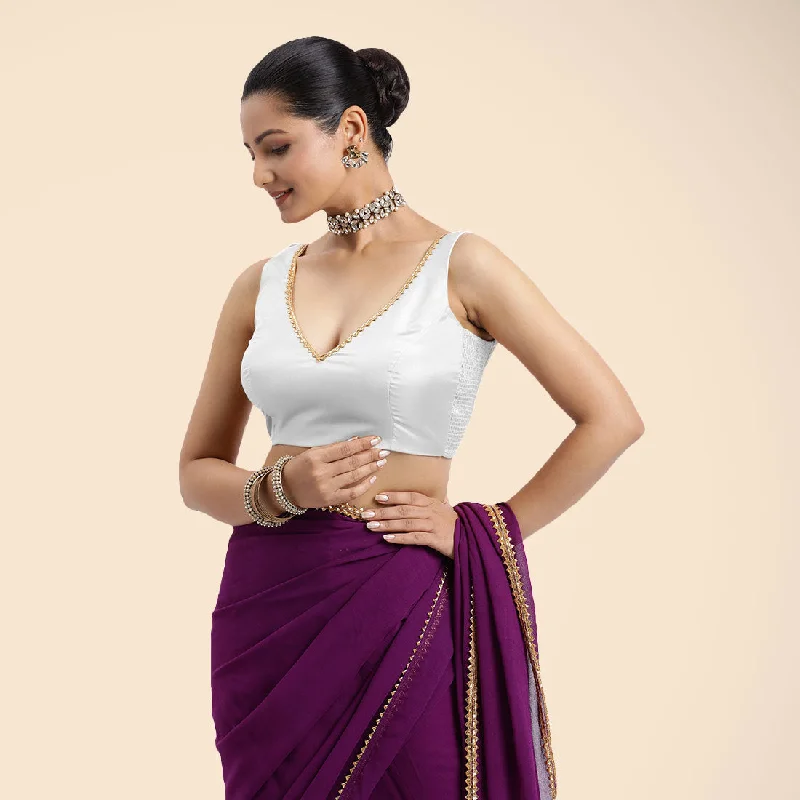 Raisa x Tyohaar | Pearl White Sleeveless FlexiFit™ Saree Blouse with V Neckline with Golden Gota Lace Embellishment and Back Cut-out with Tie-Up